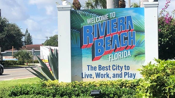 A sign that says welcome to riviera beach florida